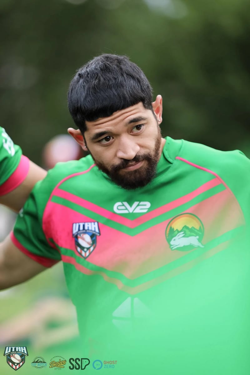 Rabbitahz player glances sideways with a wry look during the huddle