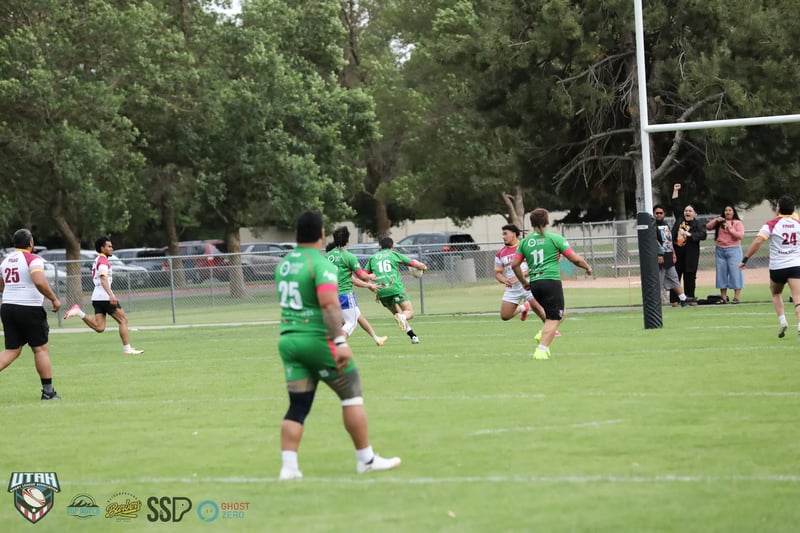 Broncos and Rabbitahz players chase the play toward the goalposts in the preseason shootout.