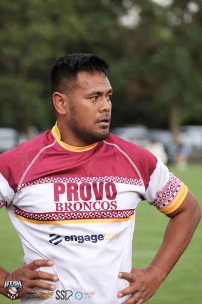 Tight portrait of a Provo Broncos player looking off to the side before the game