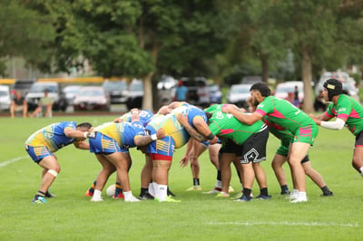 Rabbitahz and Broncos forwards packing down for a scrum mid-match