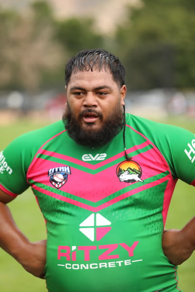 Close-up of a Rabbitahz player in the green and pink jersey between plays